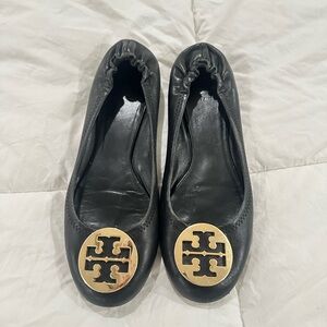 Tory Burch Black Flats with Gold Emblem